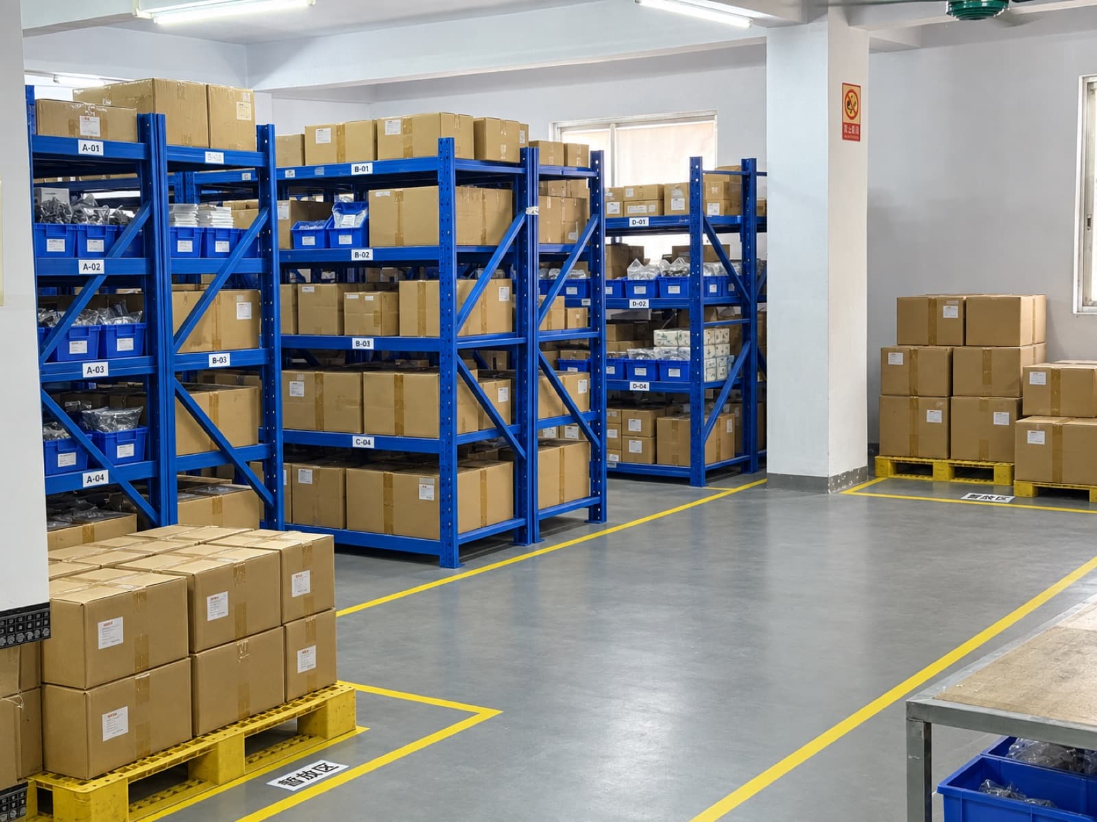 Shelves holding sorted components and cartons
